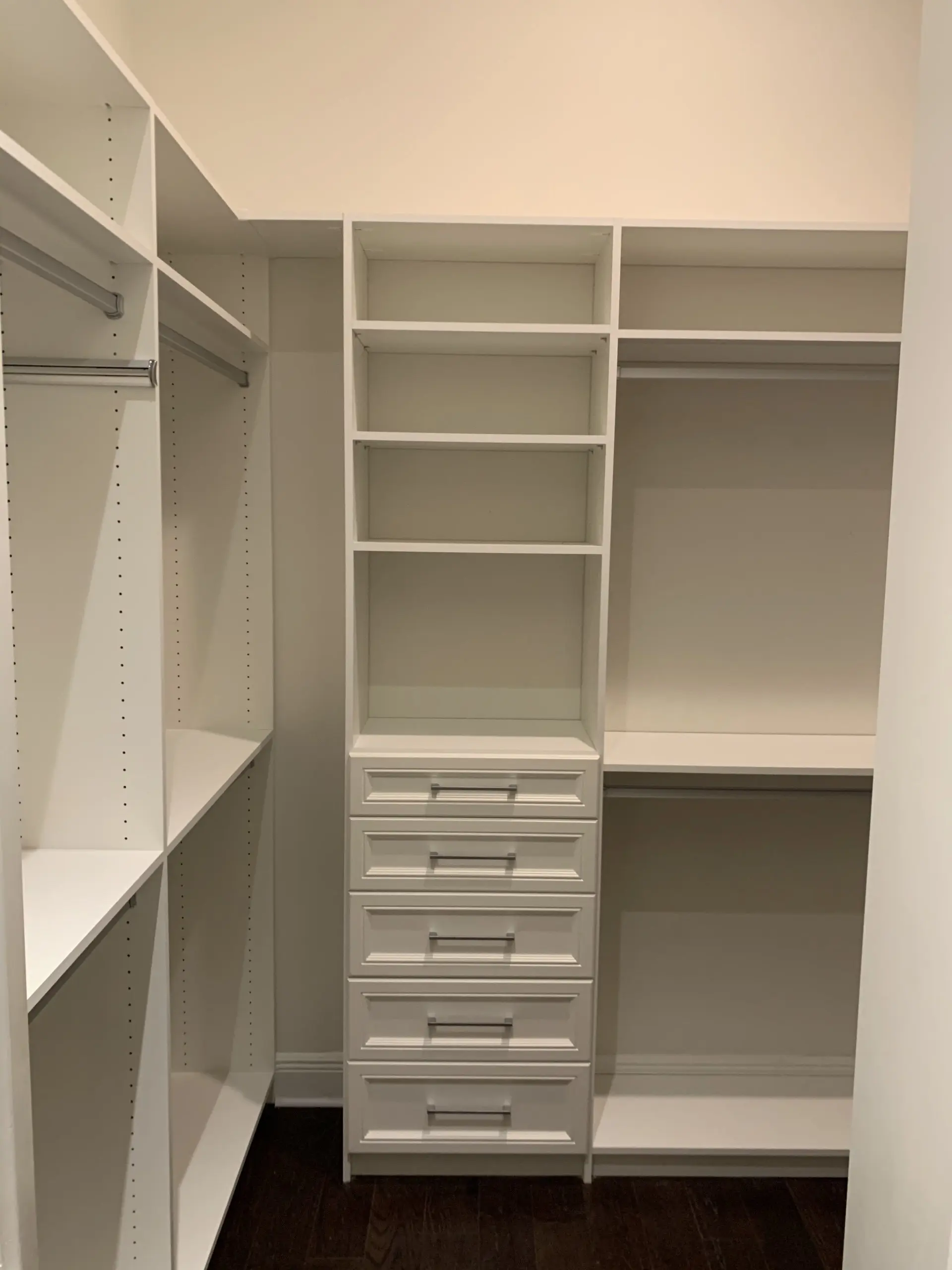 White closet system with Milan drawer fronts
